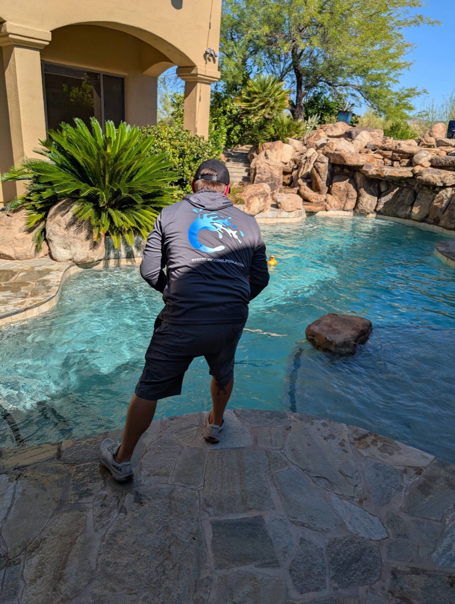 Steve McCool working on a pool in the Arizona desert